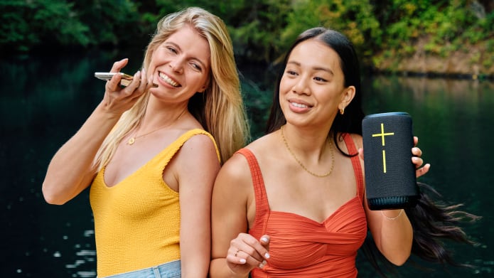 Women holding Everboom speaker